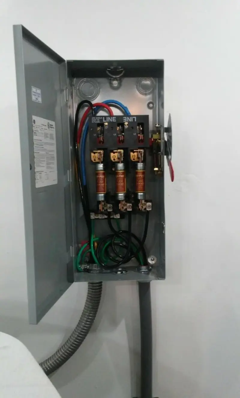 Three-phase disconnect switch installed for Smoke Detector Installation in Tri-City